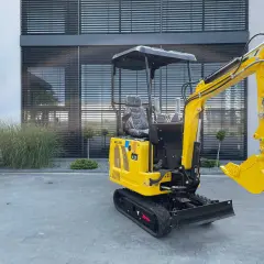 Żółta mini koparka GG1100 na gąsienicach, gotowa do pracy. Zastanawiasz się, ile kosztuje mini koparka?